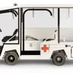 Side of fully-equipped Motrec MX-480 ambulance truck.