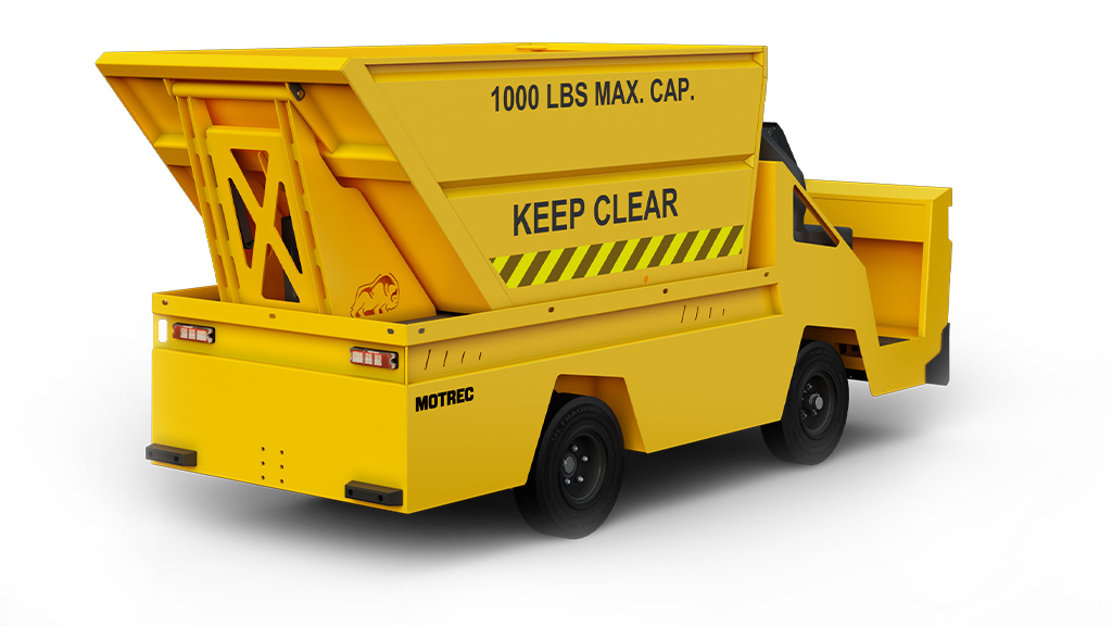 Back angle of yellow Motrec MX-480 Refuse Hauler custom truck.