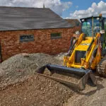 JCB 1CXT Backhoe Loader on construction site.