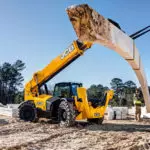 JCB 510-56 Telehandler lifting materials.