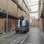 Advance SC6500 cleaning warehouse floors.
