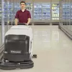 Advance SC901 cleaning grocery aisle floors.