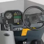 Advance SW8000 rider sweeper steering wheel and operator control area.