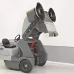 Advance SW8000 rider sweeper, hood lifted.