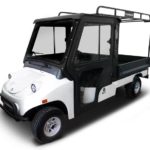Columbia Utilitruck with cab and custom poles on bed.