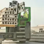 Combilift C30000 forklift transporting concrete.