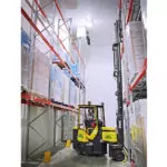Combilift Cold Store Aisle Master with mast up inside food and beverage warehouse.