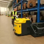 Combilift Combi-PPT 3,000 kg to 16,000 kg pedestrian stacker in warehouse.