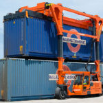 Combilift SC3 Telescopic Toplift straddle carrier container handler moving containers.