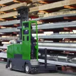 Combilift Combi-GT Side Loading Forklift in action in warehouse aisle.