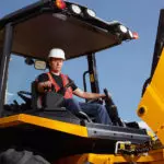 JCB 3CX Backhoe Loader operator driving.
