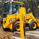 JCB 3CX Compact Backhoe Loader digging.