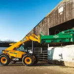 JCB 538-60 AGRI telescopic handler working on a farm.