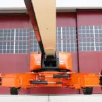 JLG 1850SJ boom lift wheels and axels.