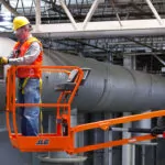 JLG 26E boom lift being used to provide vent maintenance.