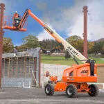 JLG 460SJ telescopic boom lift outdoors.