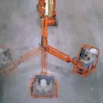 JLG E300AJP boom lift rotation.