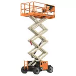 Raised JLG ERT3369 electric rough terrain scissor lift.