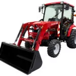 Mahindra 1635 HST tractor with cab and bucket loader attachment.