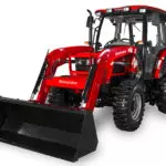 Mahindra 6065 utility tractor with cab.