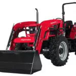 Mahindra 6075 utility tractor with bucket attachment.