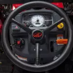 Mahindra eMax 25L sub-compact tractor steering wheel.