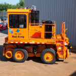 Rail King RK330 G6 mobile railcar mover in outdoor lot.