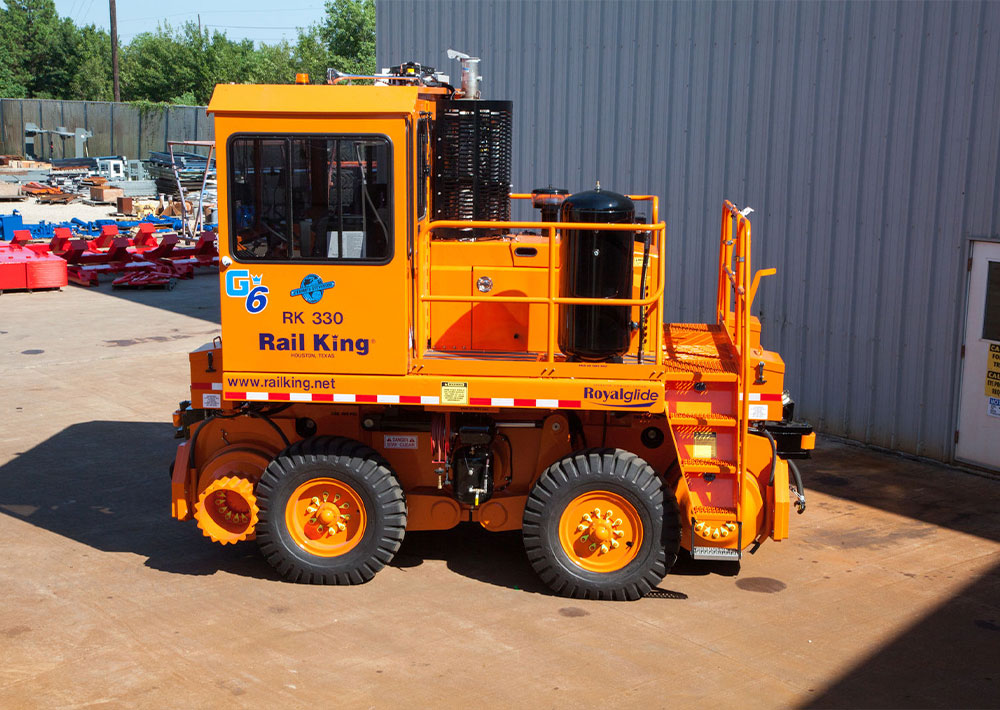 Rail King RK330 G6 mobile railcar mover in outdoor lot.