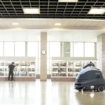 Advance Liberty SC50 professional autonomous scrubber cleaning large empty room.