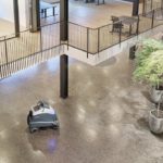 Advance Liberty SC50 autonomous scrubber cleaning business floor.