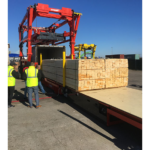 Combilift Combi-CSS container slip sheet holding lumber.