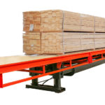 Combilift Combi-CSS container slip sheet holding lumber.