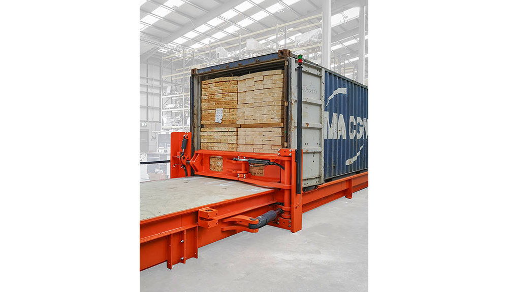 Combilift Combi-CSS container slip sheet with container and lumber.