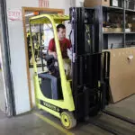 Mariotti ME AC 8c microlift being driven through a doorway.