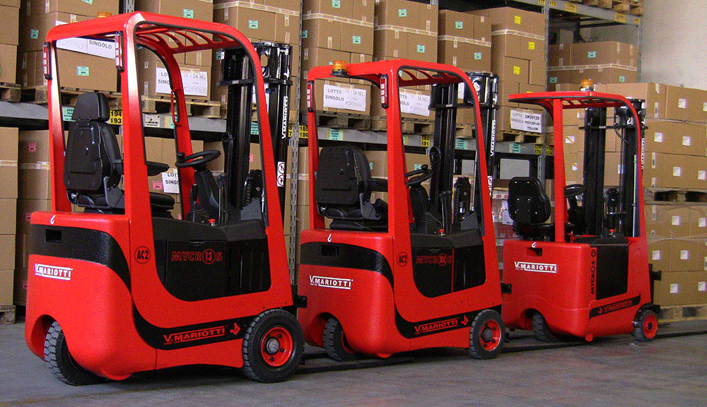 Mariotti MYCROS AC Series Forklifts lined up indoors.