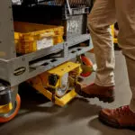 Taylor-Dunn Jtec CarryMore industrial cart burden carrier operator area.