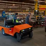 Taylor Dunn R380 Utility Vehicle being driven in work shop.