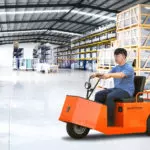 Taylor-Dunn SS-536 Personnel Carrier Utility Vehicle in action in open warehouse.