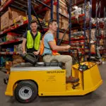 Taylor-Dunn SS-536 Personnel Carrier Utility Vehicle in action in warehouse.