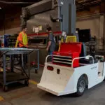 Taylor-Dunn SS-546 Personnel Carrier Utility Vehicle in workshop.