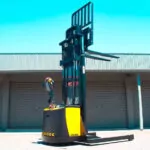 TASK Forklifts CONDA straddle stacker outdoors, mast up.