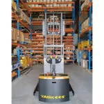 Operator view of TASK forklifts Taipan Straddle Stacker in warehouse.