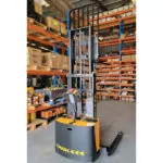 TASK Taipan with mast up in warehouse.