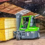 Combilift Combi-CB15-5E transporting wide lumber pallets.