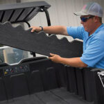 Cushman Hauler utility vehicle cargo bed divider.