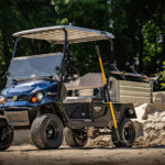 Cushman Hauler Pro-X utility vehicle on rocky, rough terrain.