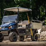 Cushman Hauler Pro-X utility vehicle on rocky, rough terrain.