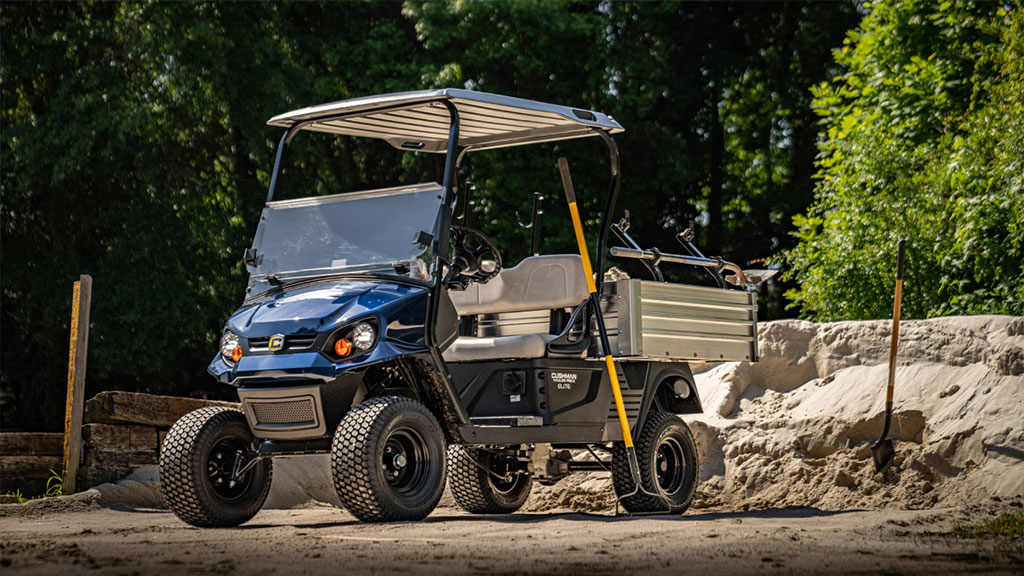 Cushman Hauler Pro-X utility vehicle on rocky, rough terrain.
