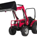 Mahindra 2645 Shuttle compact utility tractor with raised bucket loader attachment.
