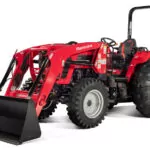 Mahindra 5155 4WD Tractor with bucket loader attachment.